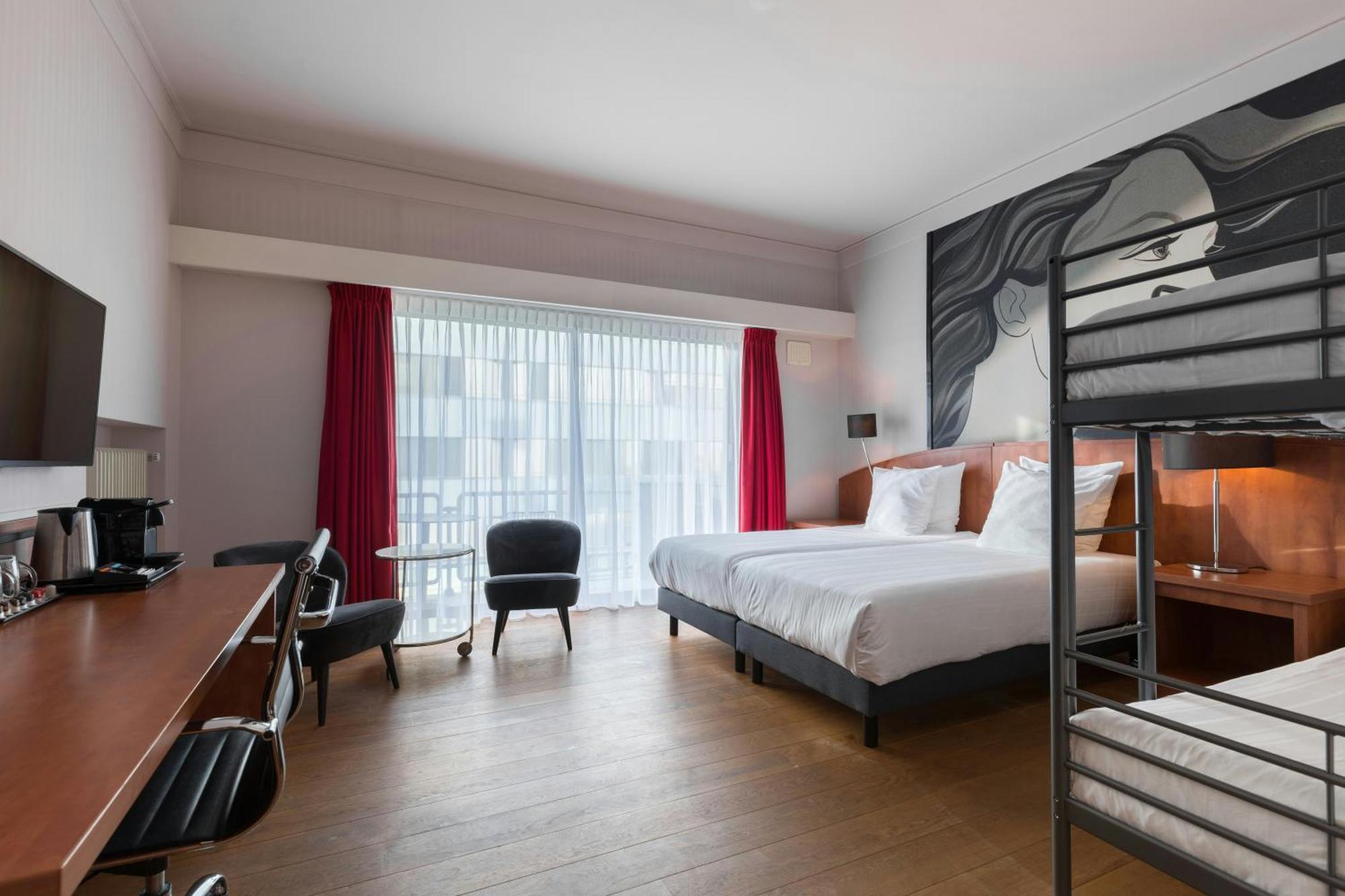 Comfort Kamer met 1 tweepersoonsbed en 2 eenpersoonsbedden