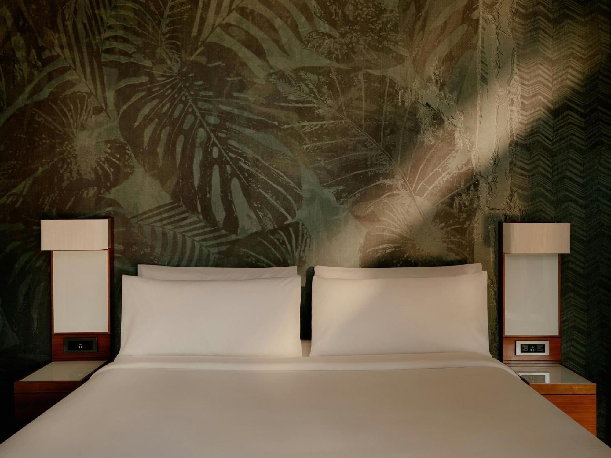 Kamer met Kingsize Bed en Uitzicht op de Stad