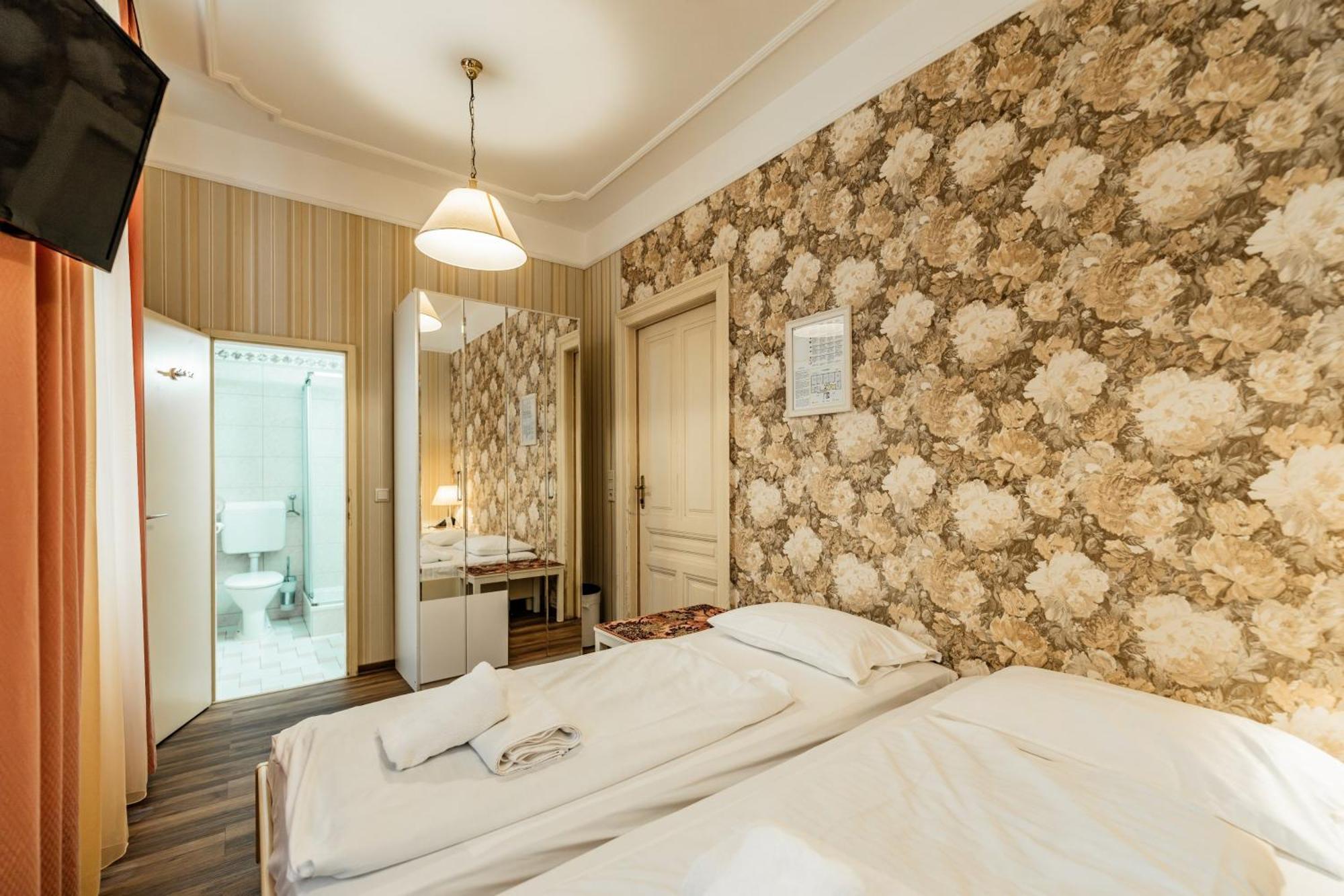 Tweepersoonskamer met 2 Aparte Bedden