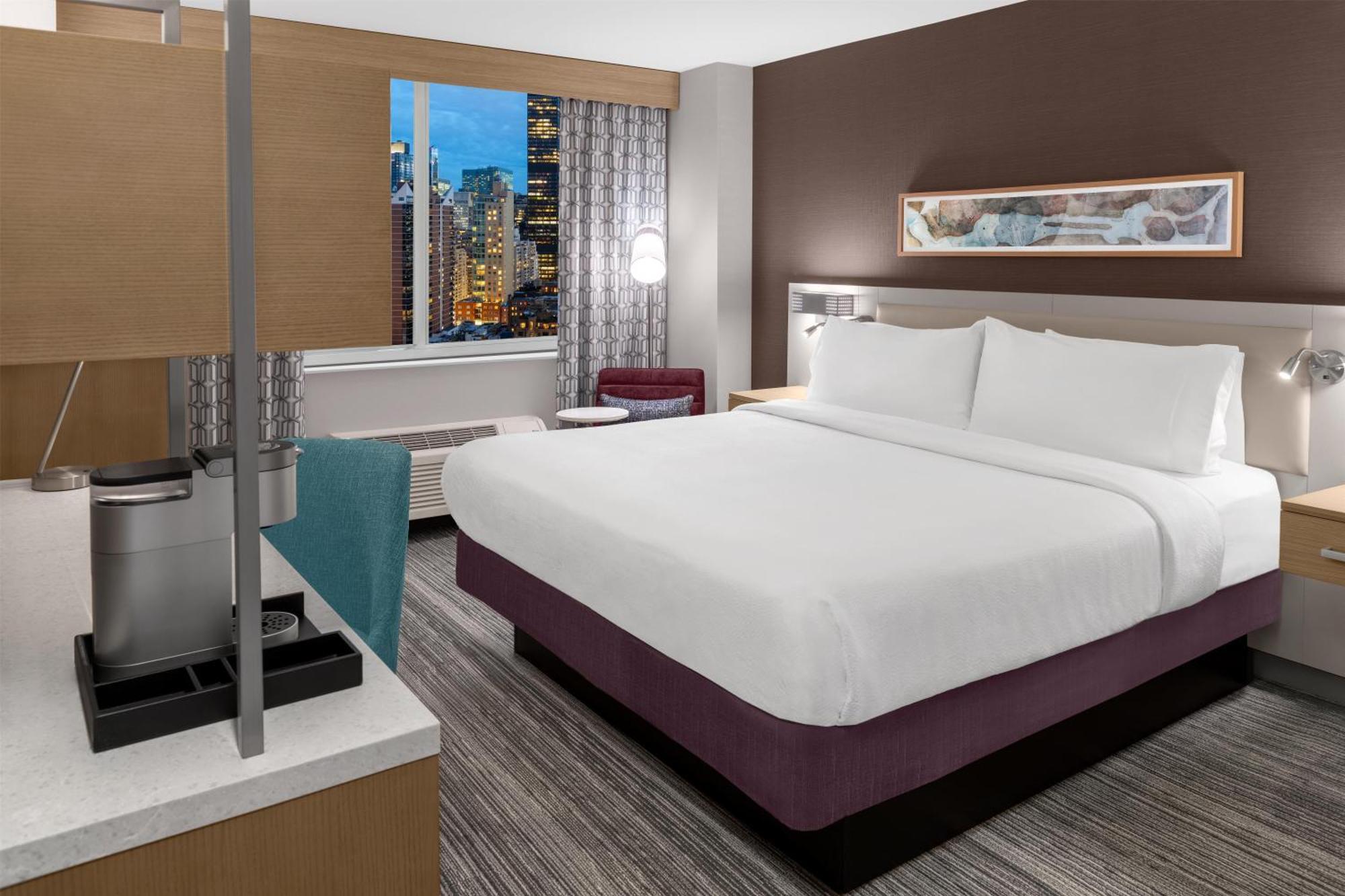 Kamer met Kingsize Bed en Uitzicht op de Stad