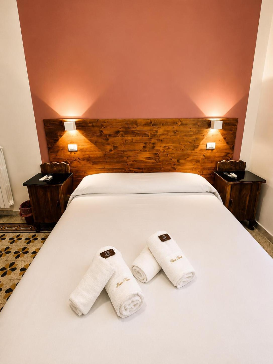 Tweepersoonskamer met 1 of 2 Bedden en Gedeelde Badkamer