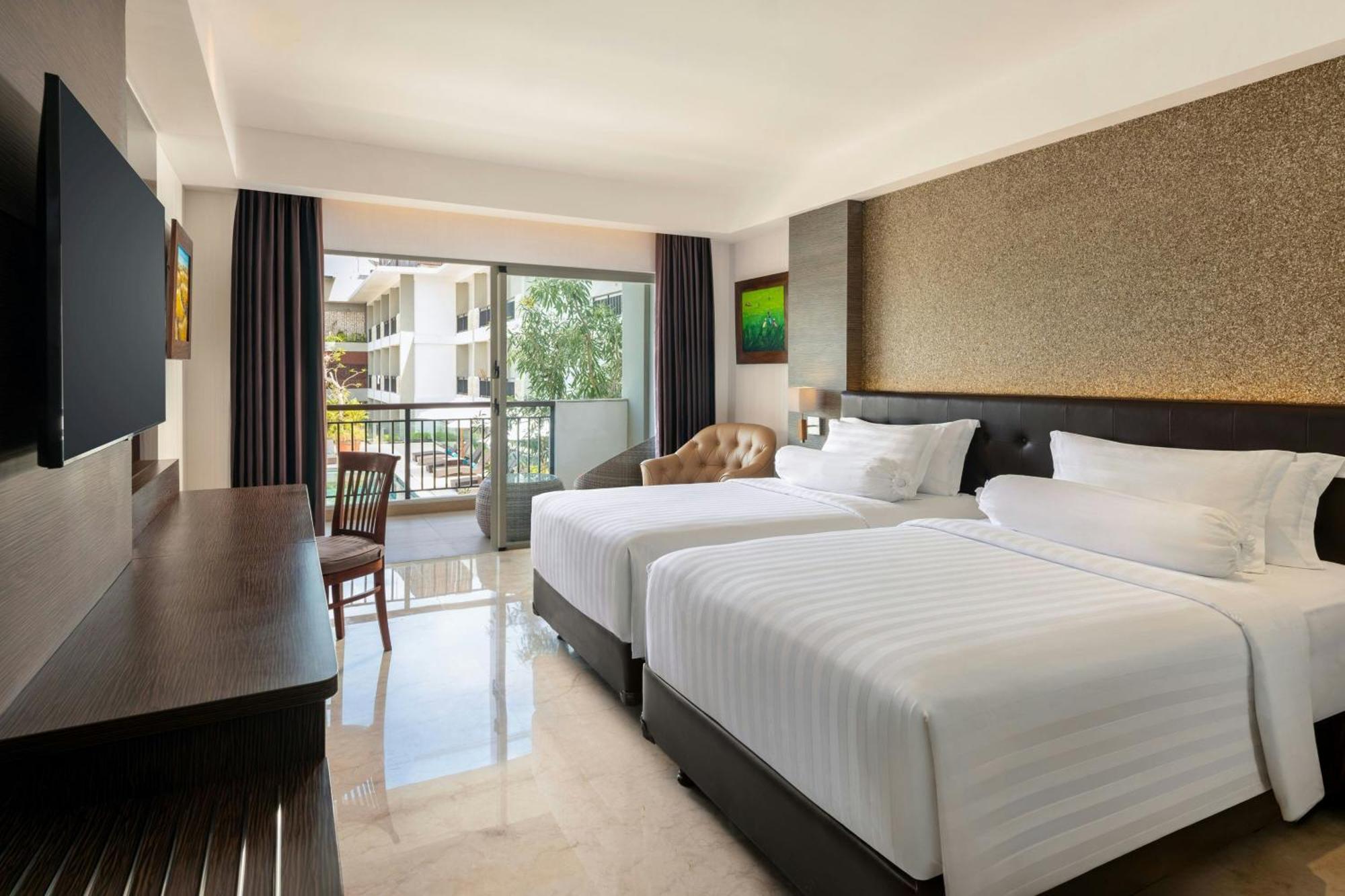 Deluxe Twin Balcony Room Pool View daily shuttle to Ubud City Photo Session Art Gallery Visit 24-hour access to Fitness Center Welcome Drink Kids Activities