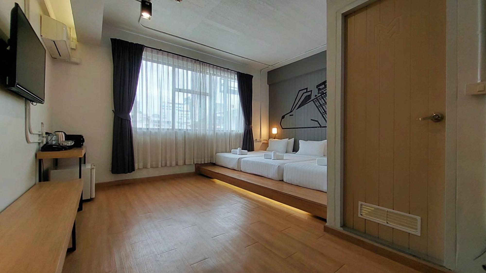 Deluxe Triple Room