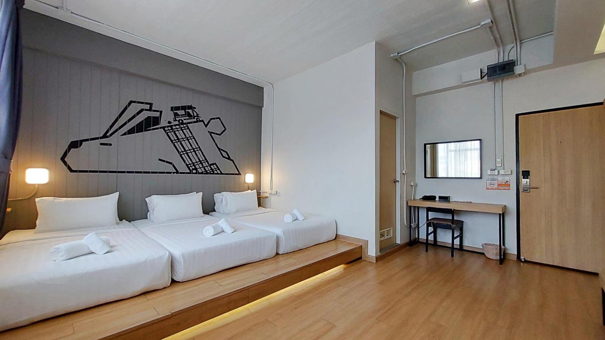 Deluxe Triple Room