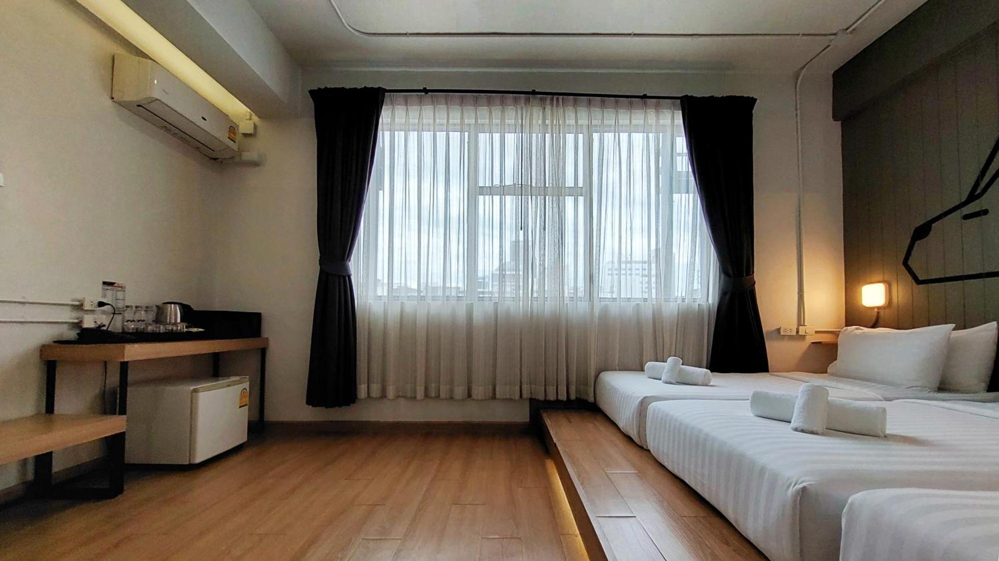 Deluxe Triple Room