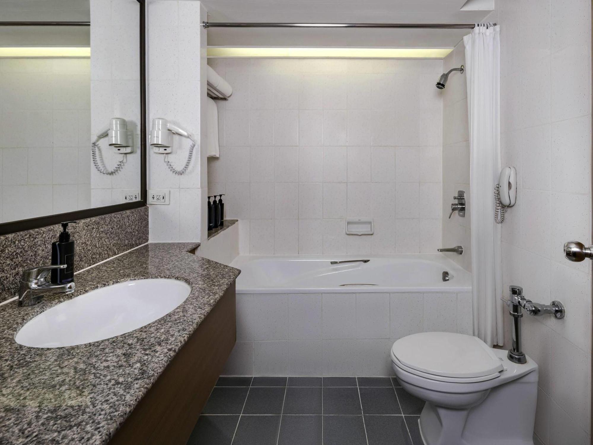 Corner Suite 1 King Bed Executive Lounge Access on Food Soft Beverage