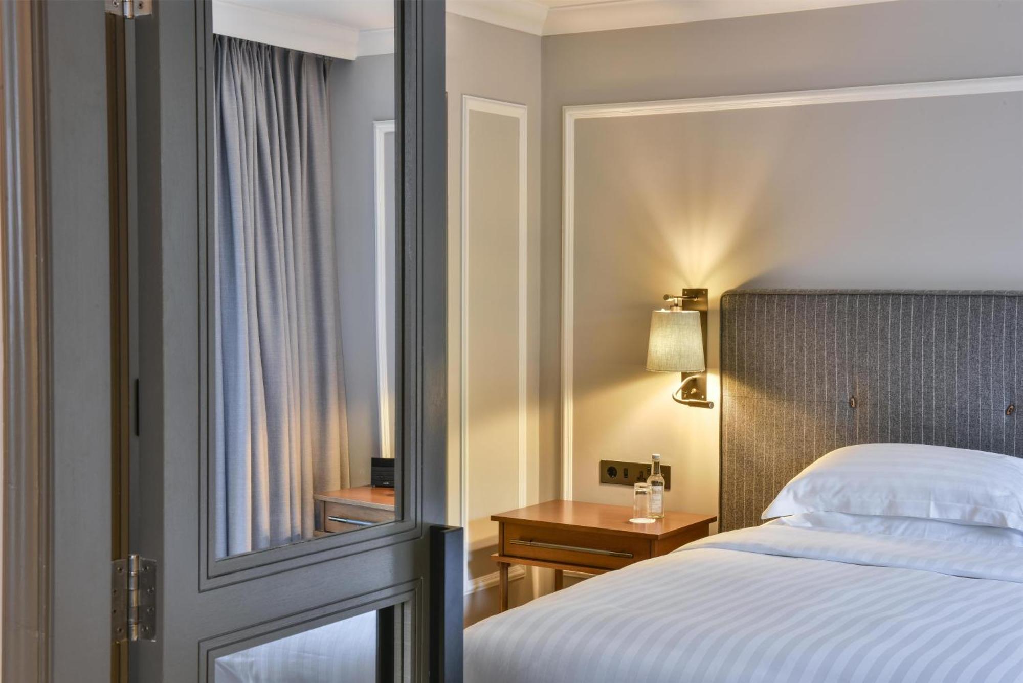 Suite met 2 slaapkamers en uitzicht op de tuin