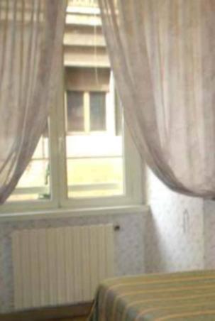 Tweepersoonskamer met 1 of 2 Bedden en Gedeelde Badkamer