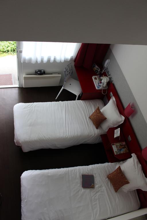 Standard Room - 2 Single Beds 1 Single Bed in mezzanine