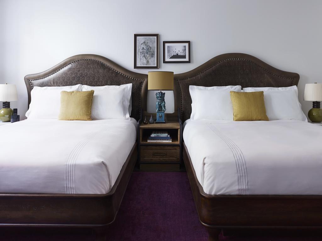 Kamer met 2 Queensize Bedden