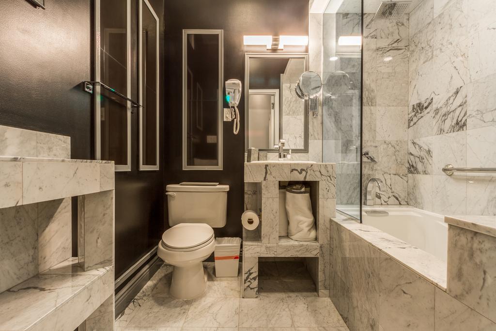 Deluxe Suite met Queensize Bed, Patio en Kitchenette
