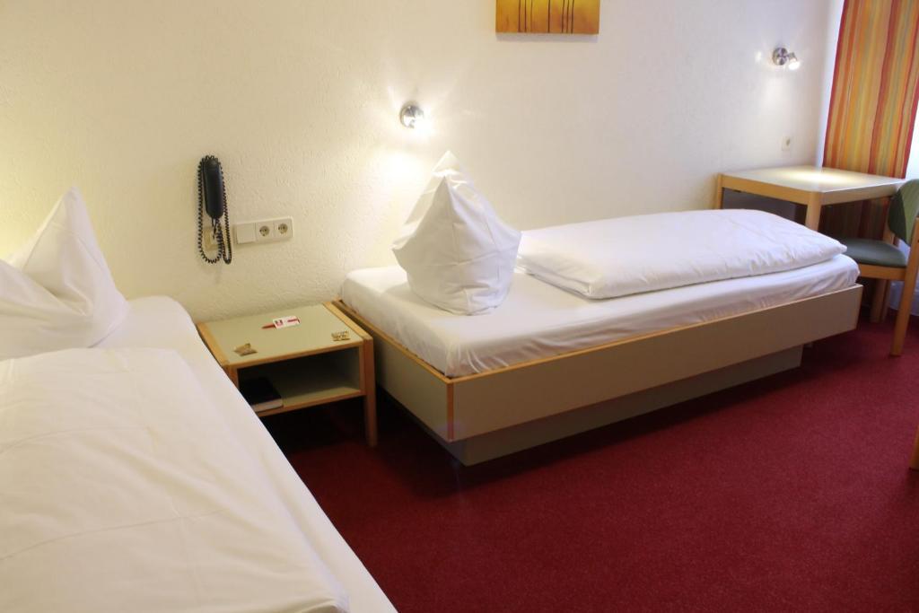 Tweepersoonskamer met 2 Aparte Bedden