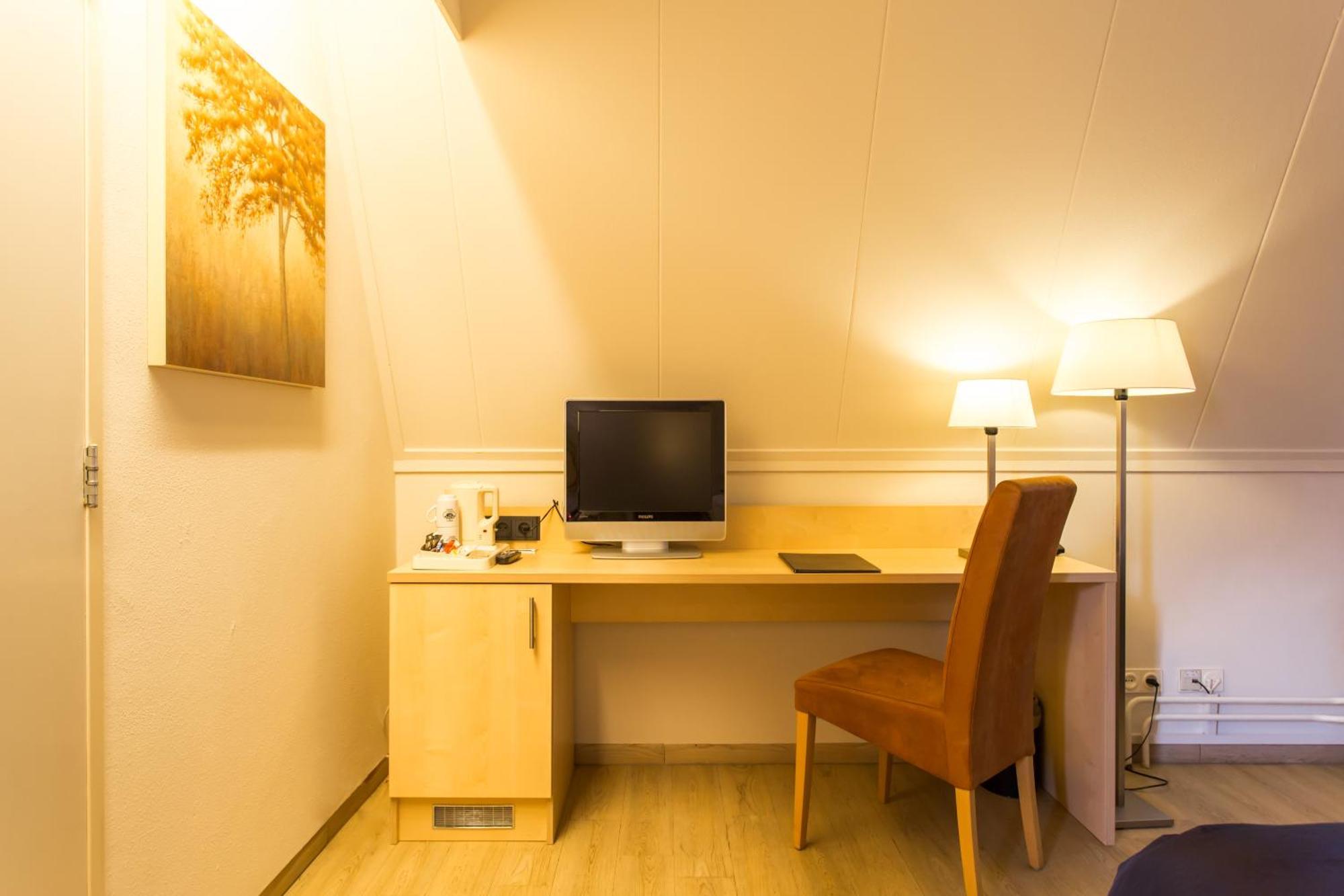 Kamer met Kingsize Bed