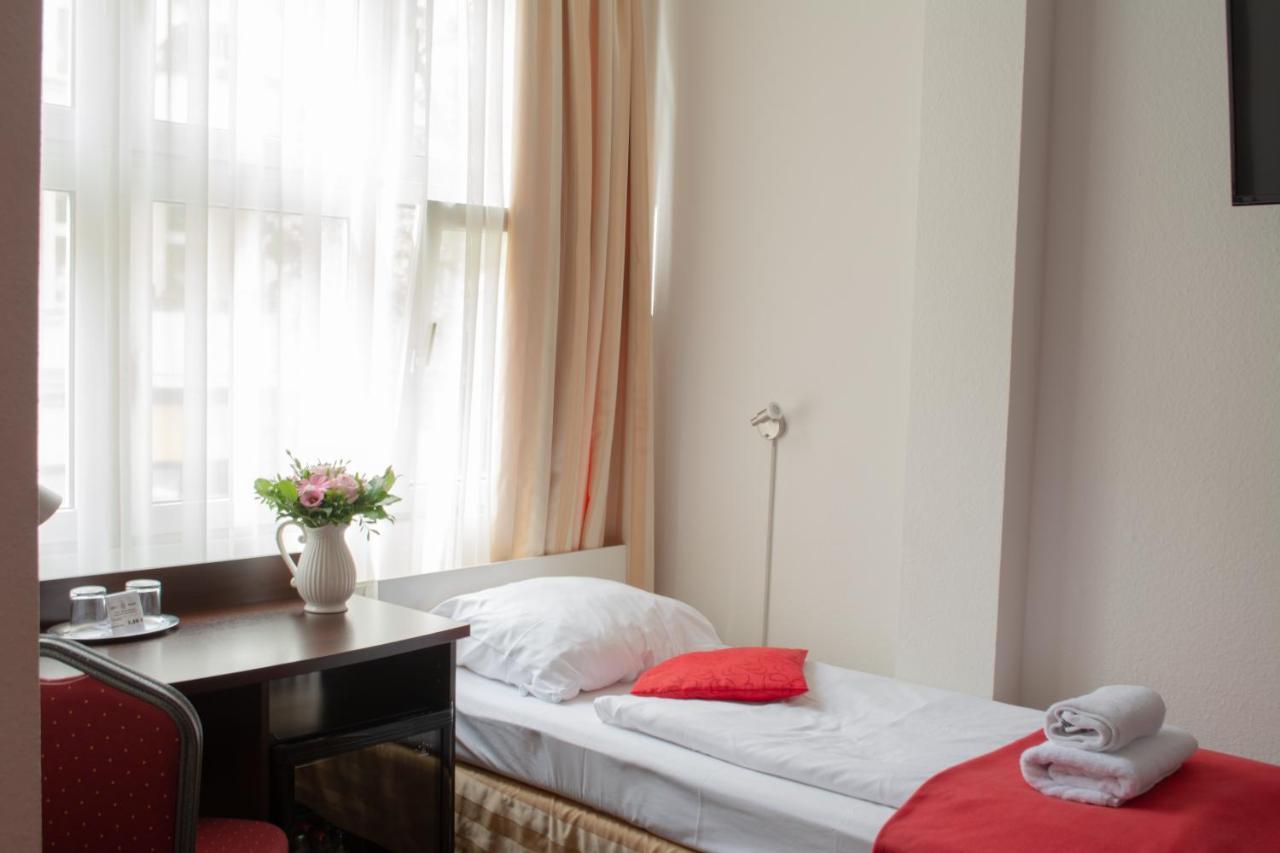 Tweepersoonskamer met 2 Aparte Bedden