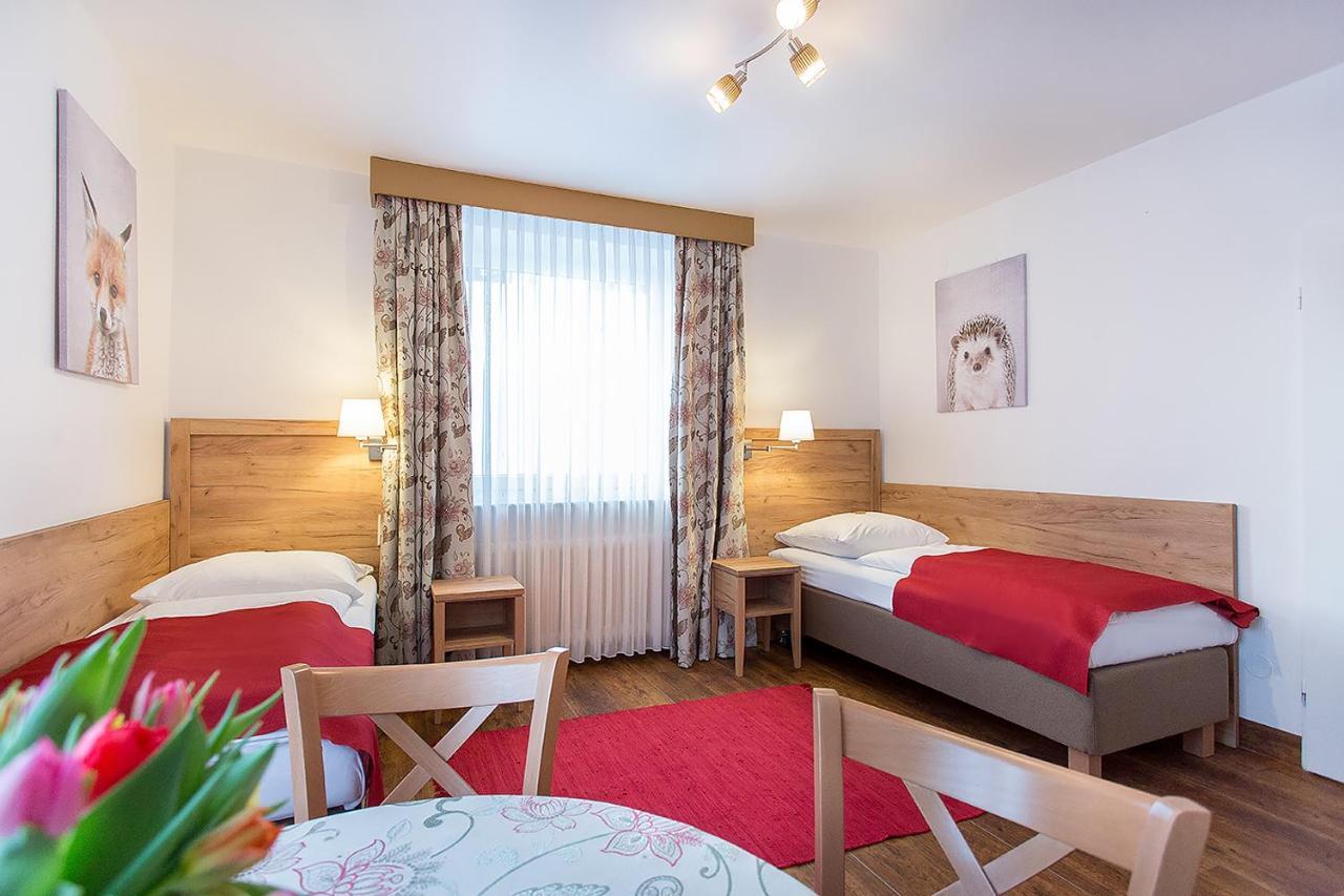 Tweepersoonskamer met 2 Aparte Bedden