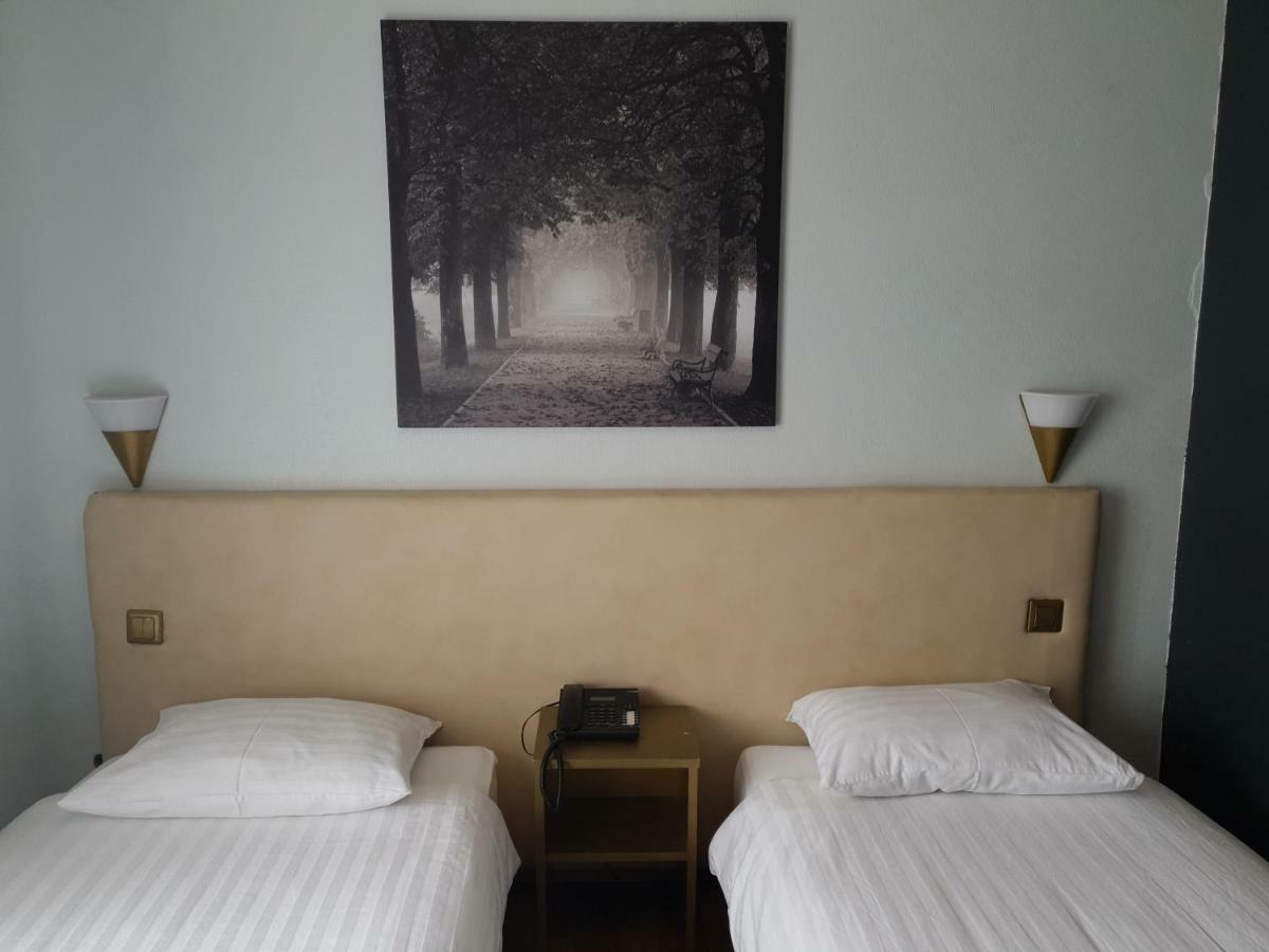 Tweepersoonskamer met 2 Aparte Bedden