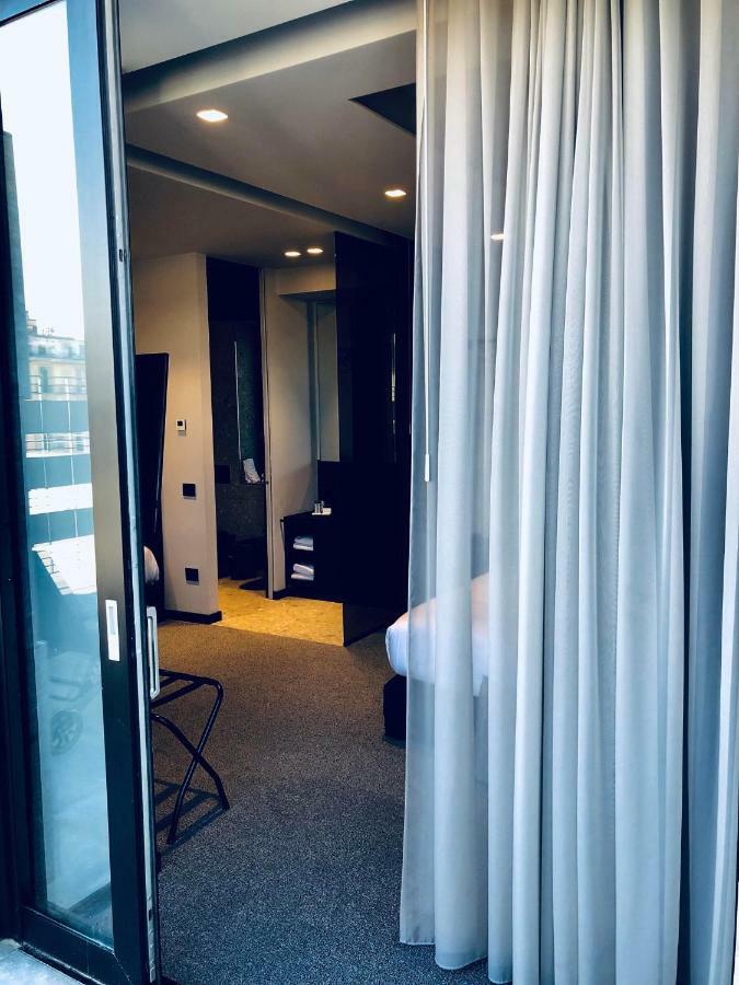 Junior Suite met Kingsize en Queensize Bed - Terras