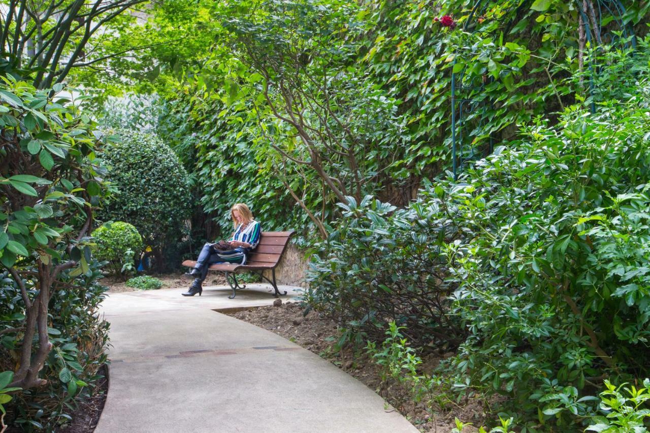 Vierpersoonskamer met Uitzicht op de Tuin.