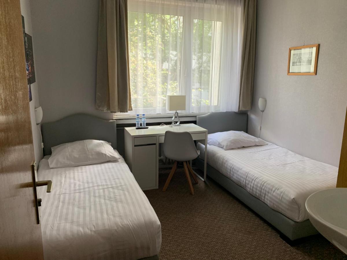 Tweepersoonskamer met 1 of 2 Bedden en Gedeelde Badkamer